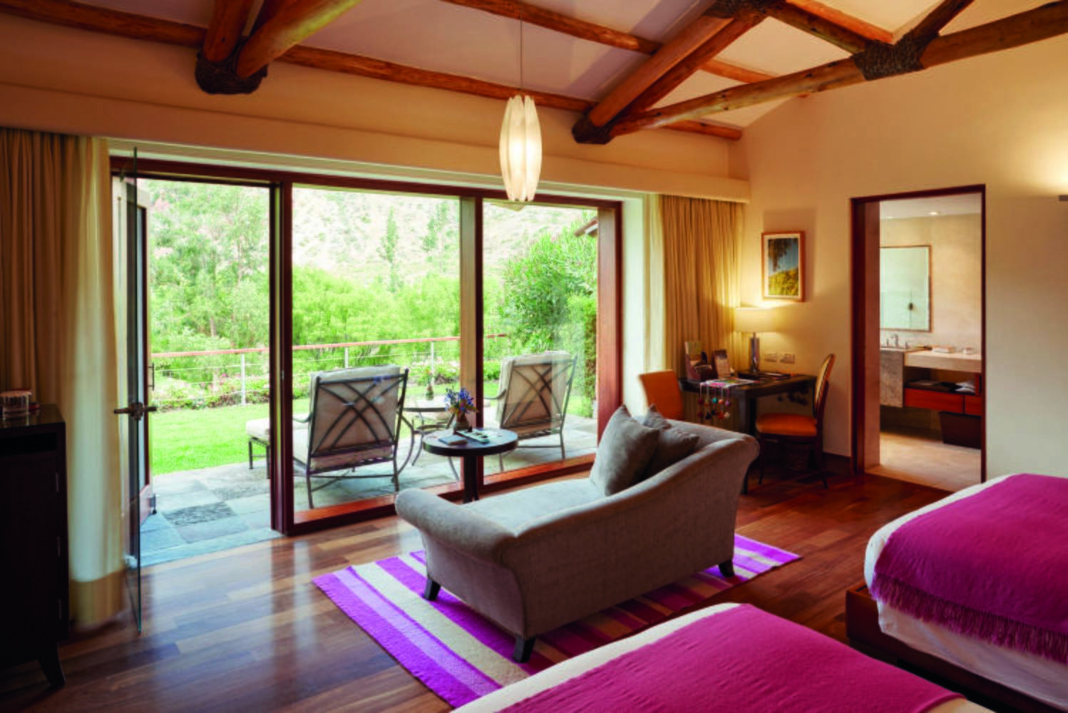 Bedroom with terrace at Belmond Hotel Rio Sagrado, Peru