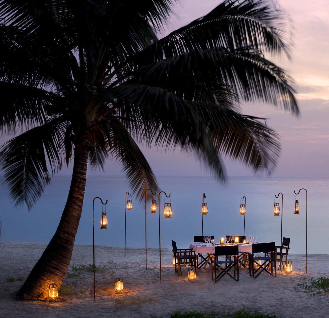 Private dining on the beach at andBeyond Benguerra Island.