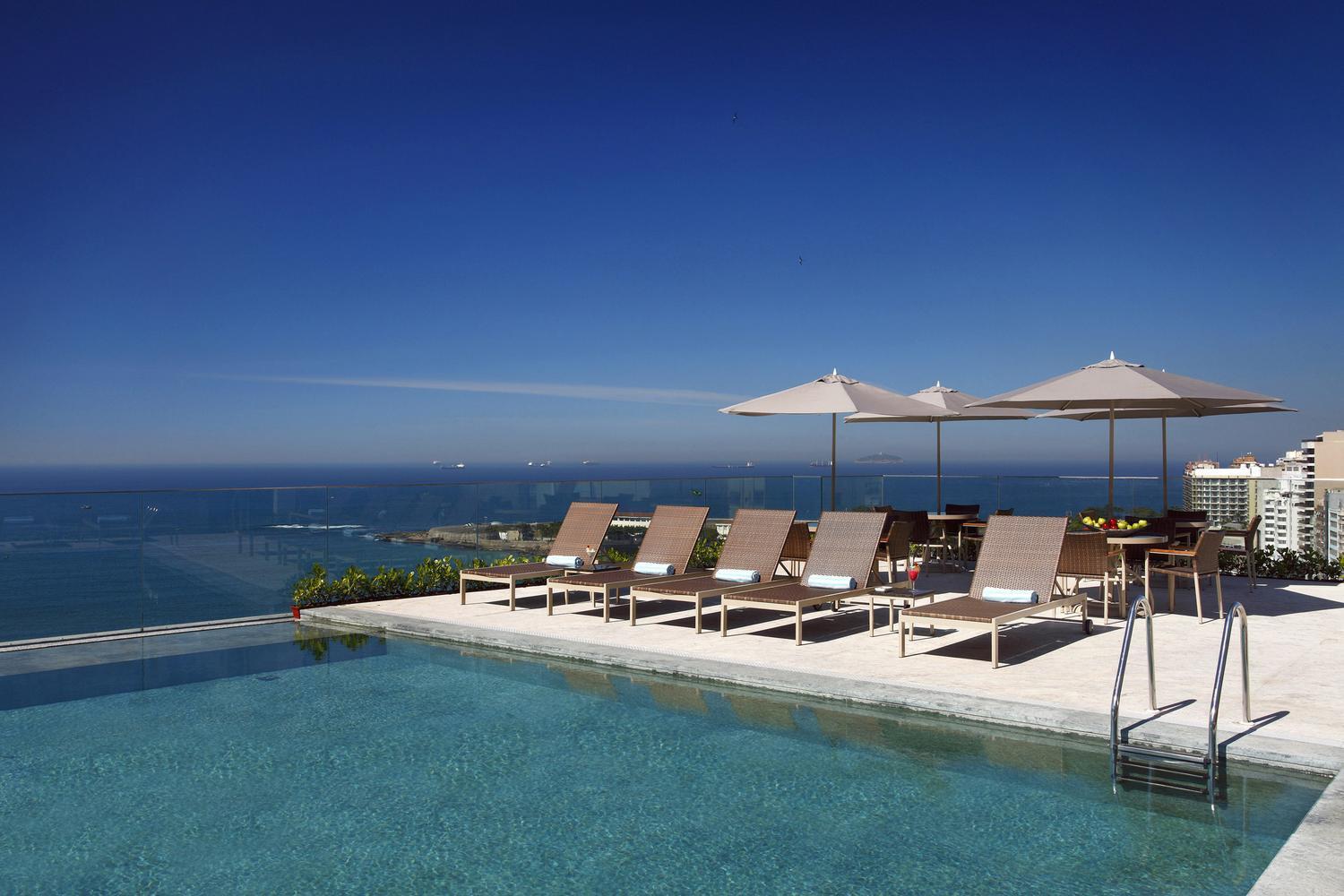 Rooftop pool with ocean views at Hotel Miramar by Windsor