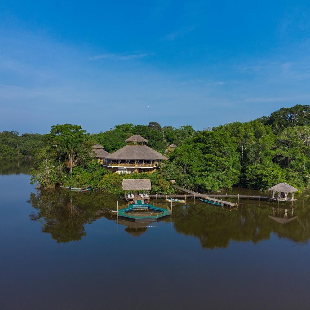 The exterior of La Selva Lodge which sits on a lagoon.