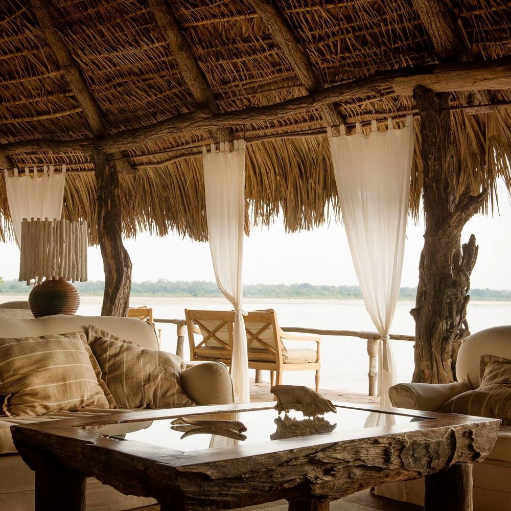Sand Rivers's open-air lounge area overlooking the Rufiji River