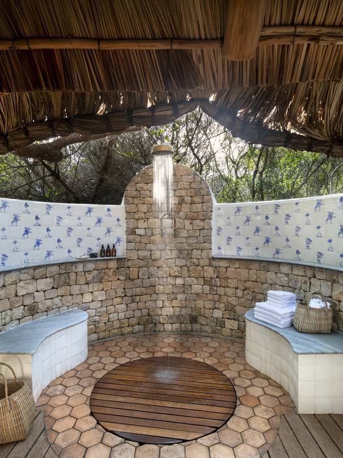 The outdoor shower of a casita or villa at andBeyond Benguerra Island.