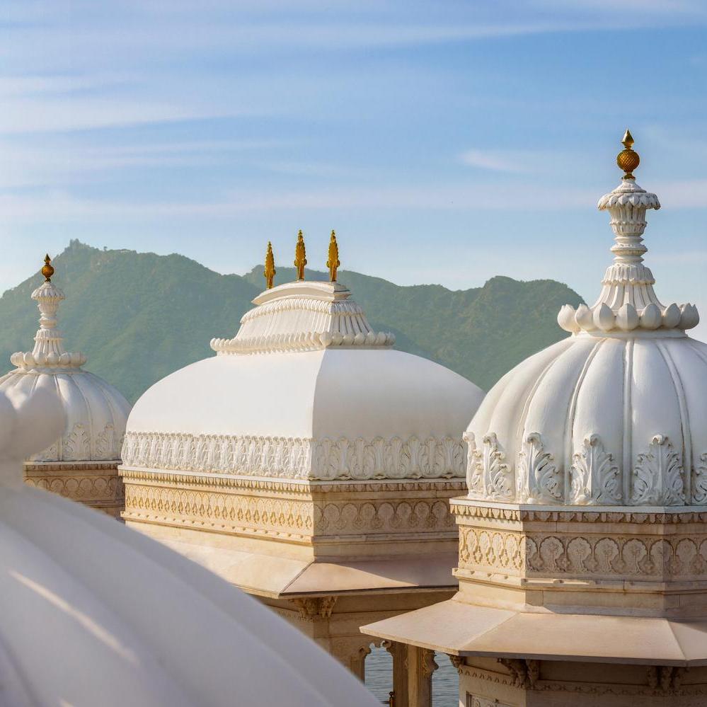 The architectural details of the Taj Lake Palace's domes.