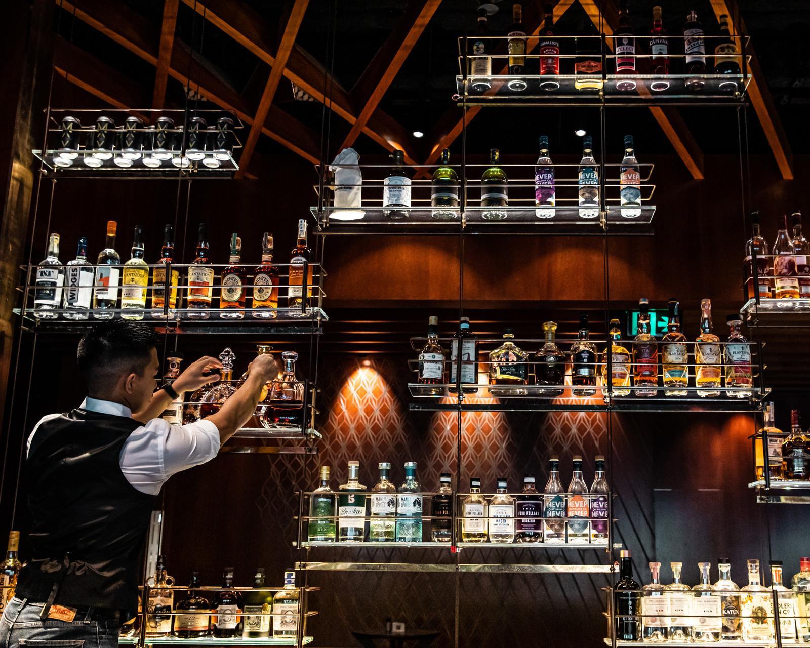 A bartender behind the bar at Four Seasons Sydney