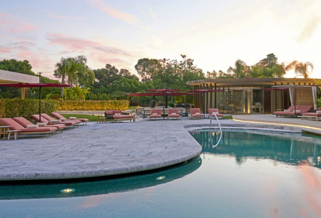 Relax at the pool at Four Seasons Hotel Ritz.