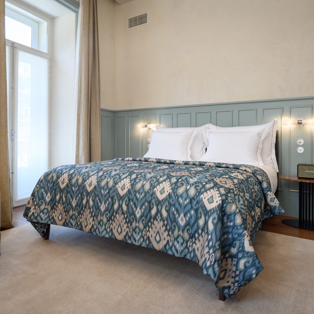 A blue coloured bedroom at Bairro Alto hotel in Lisbon