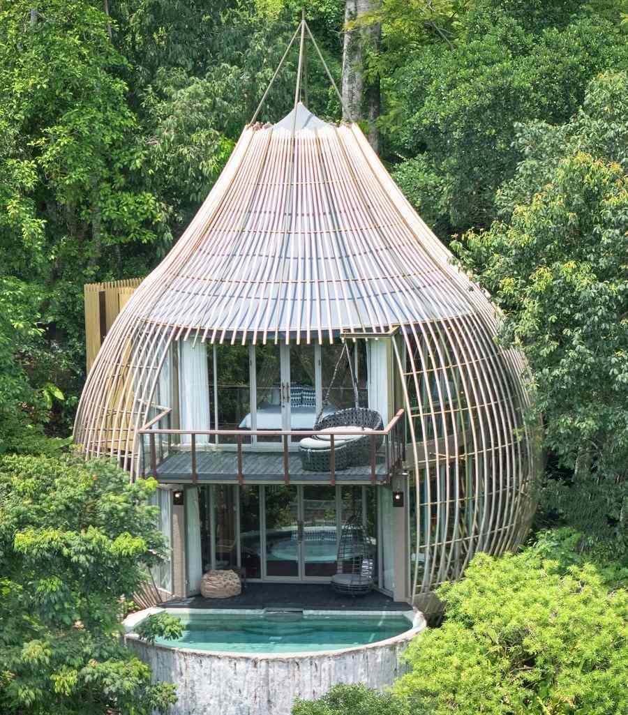 Keemala's tree villa surrounded by greenery.