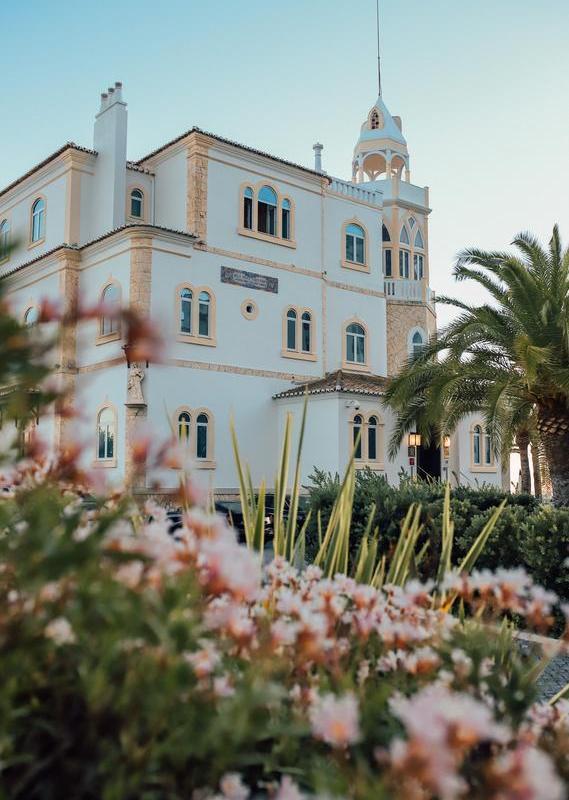 View of Hotel Bela Vista through the hotel gardens