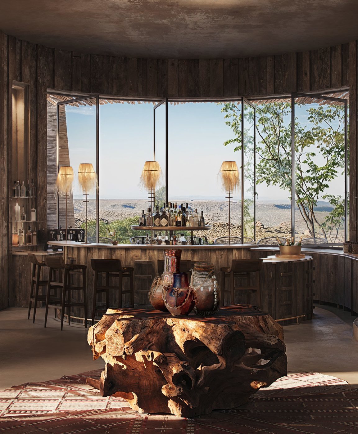 Elegant rustic bar area with large windows overlooking a scenic landscape, featuring a unique wooden table.