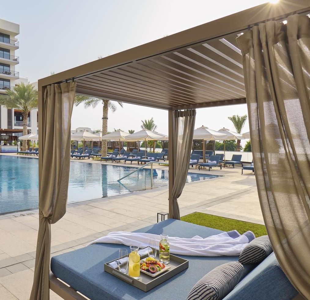 A close up of a sunbed in the pool area of Mandarin Oriental Muscat.