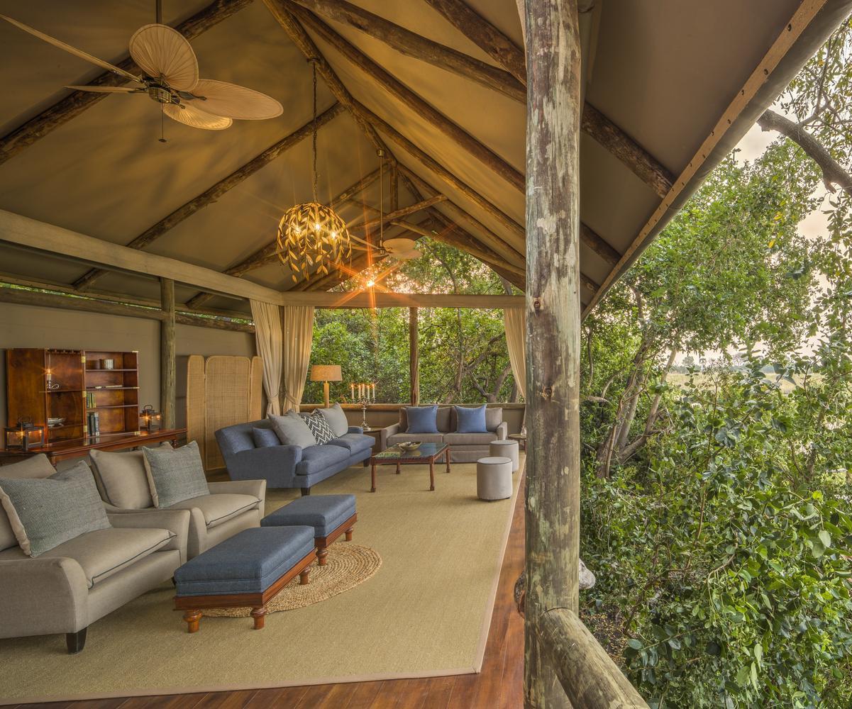 An open-air lounge area at Shinde Camp overlooking the delta.