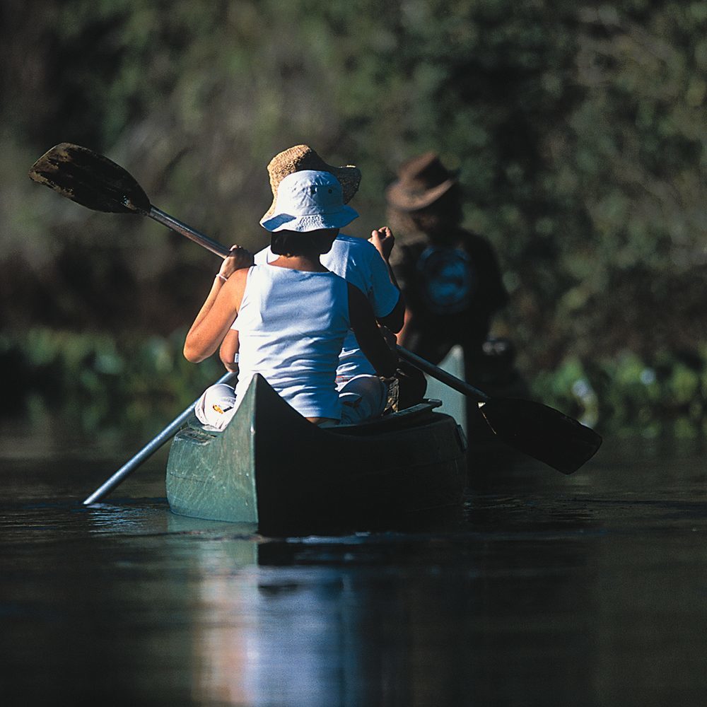 Guests canoeing at Araras EcoLodge in Brazil