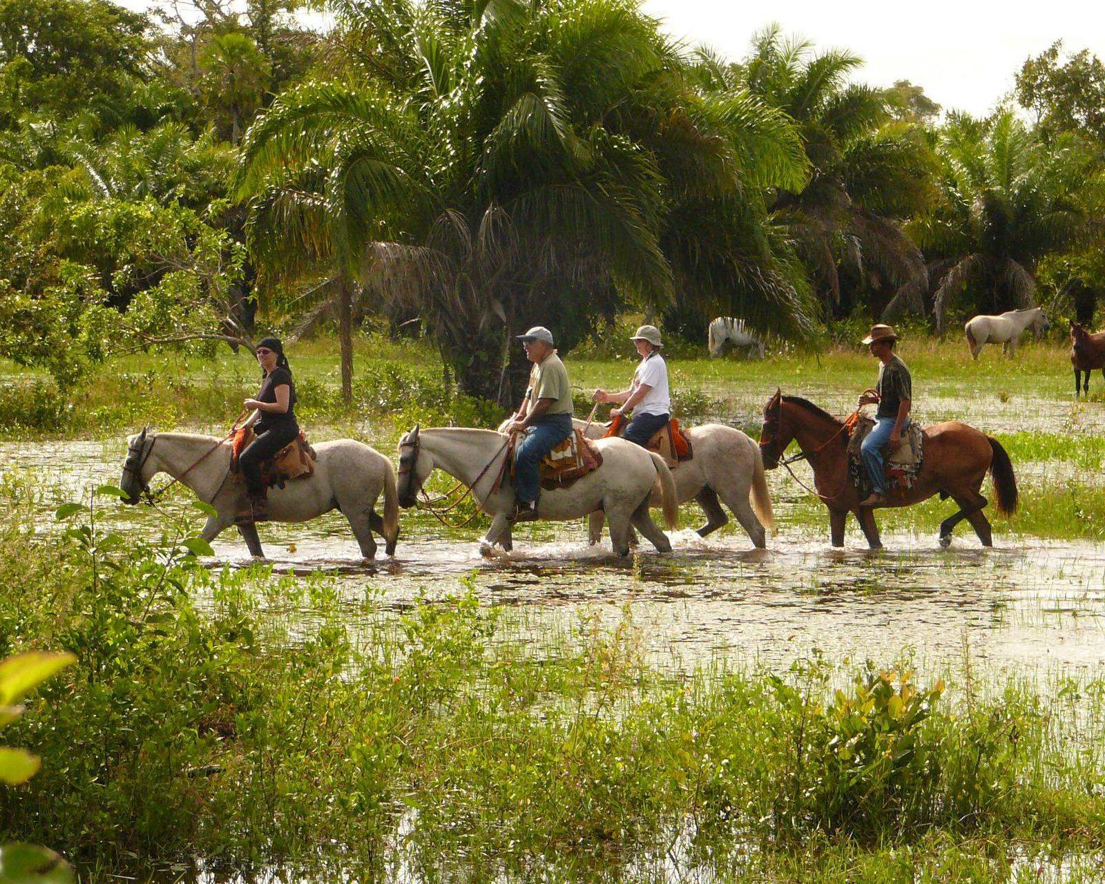 Guests horseriding at Araras EcoLodge in Brazil