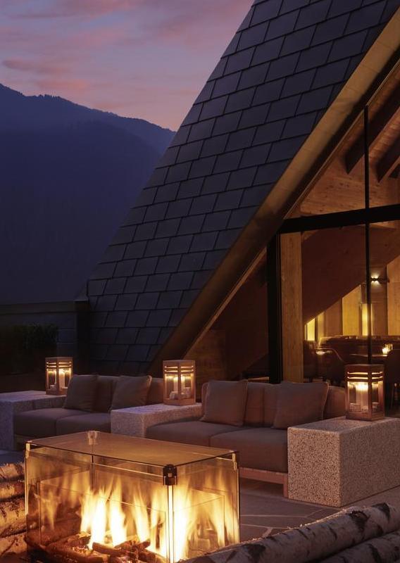 Sky lounge rooftop bar with open fire at Lefay Dolomiti