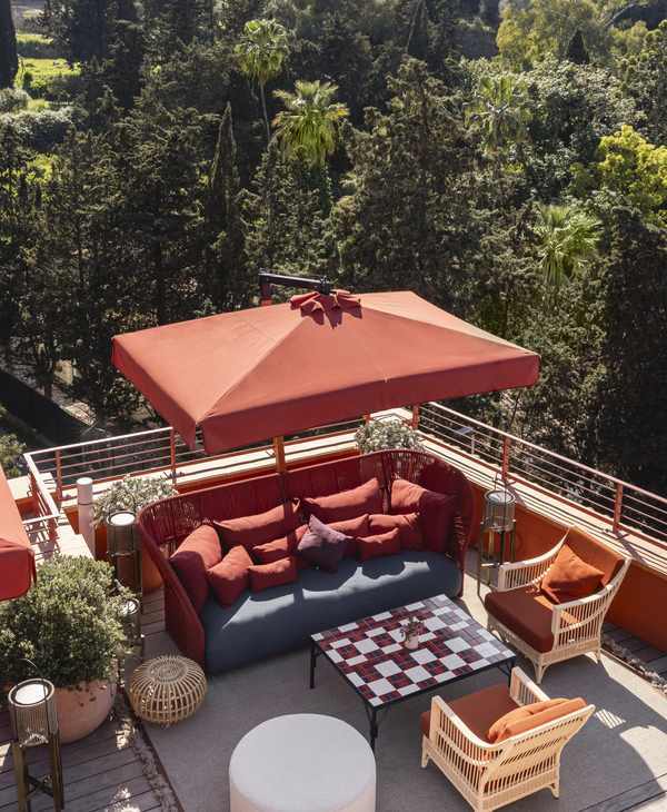 La Roqqa's restaurant terrace area featuring plush seating.