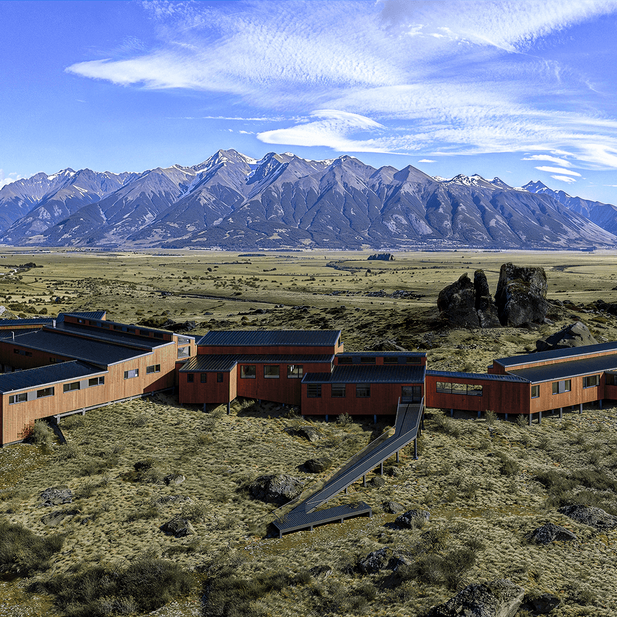 An aerial of Explora El Calafate with the Andes in the background.