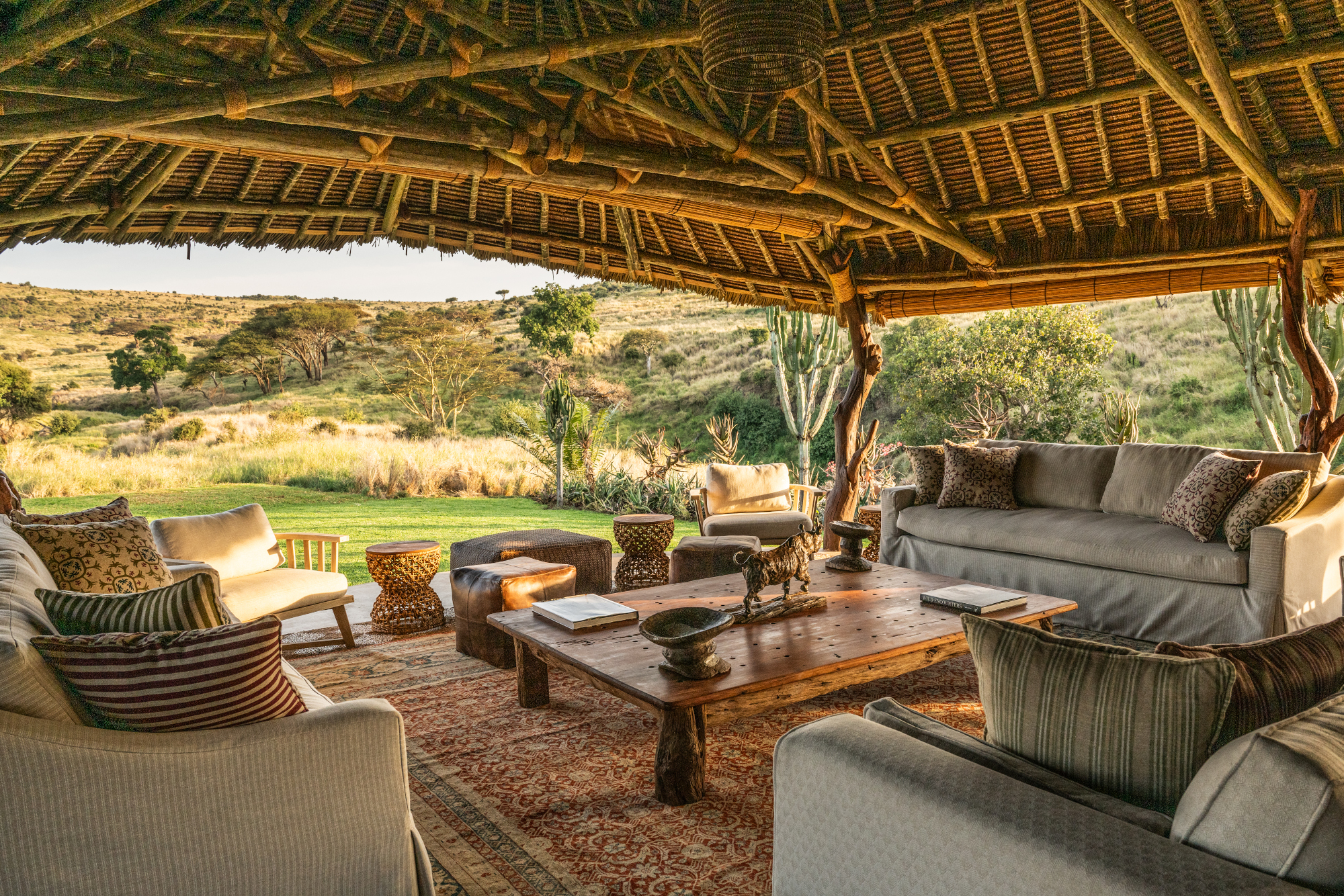An open shared area on site the hotel with tables and chairs to relax and enjoy the views