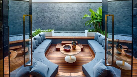 Terrace with sofas and table fronting the sea at Bianca, Iniala Beach House Villas & Suites, Phuket, Thailand
