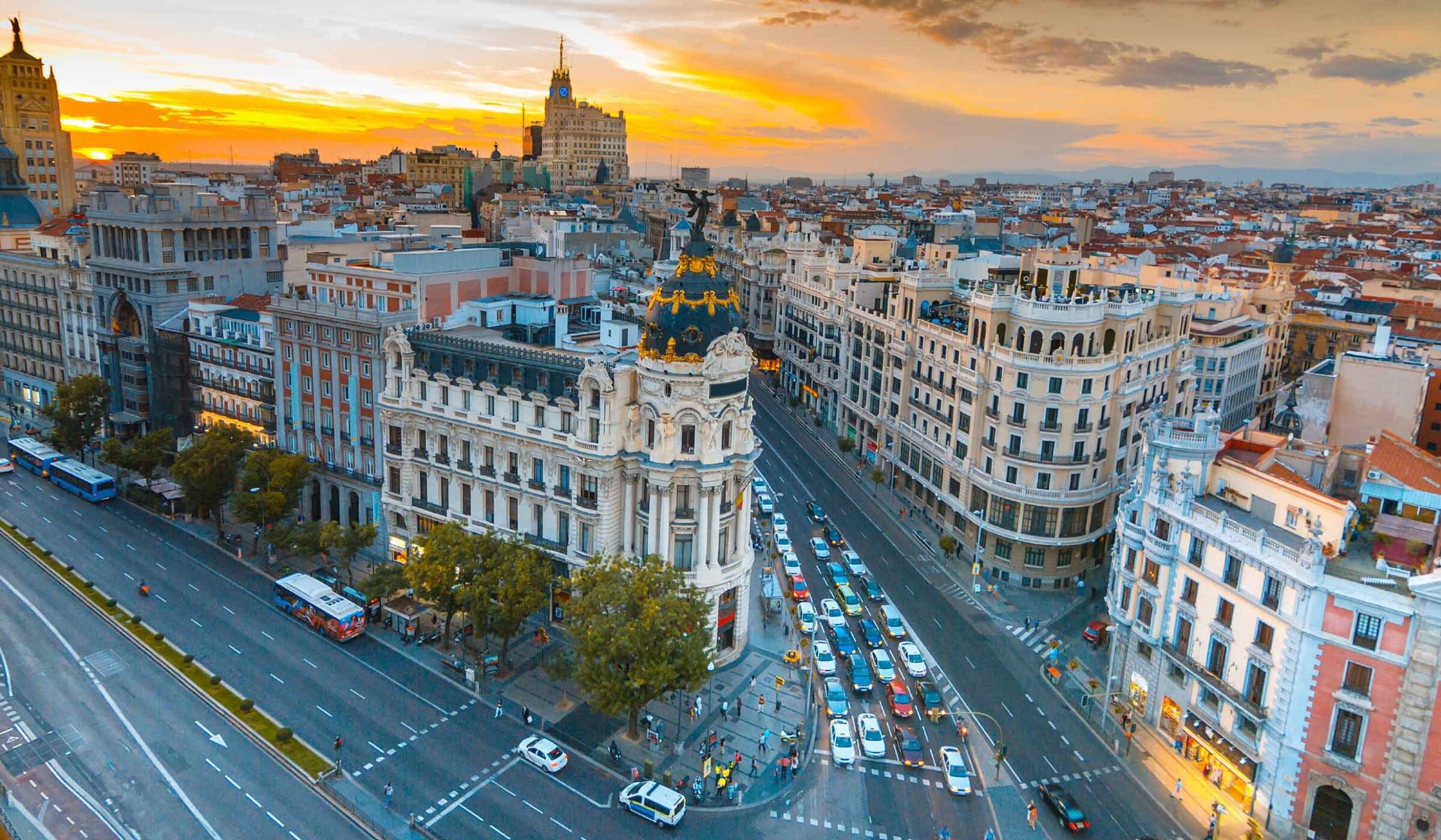 Sun setting over Gran Via, Madrid, Spain