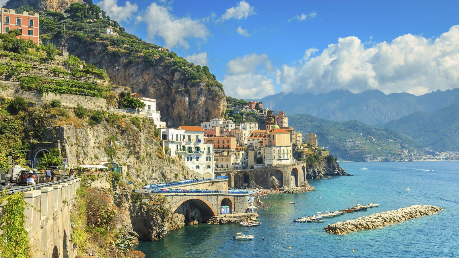 Coastal village built into a cliffside on luxury Amalfi Coast trips.