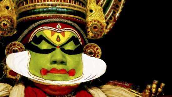 Kathakali dancer in full make up and dress, Fort Cochin, India