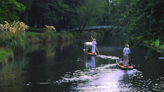 "Wedding Party in boats in Christchurch Botanical Gardens, New Zealand"