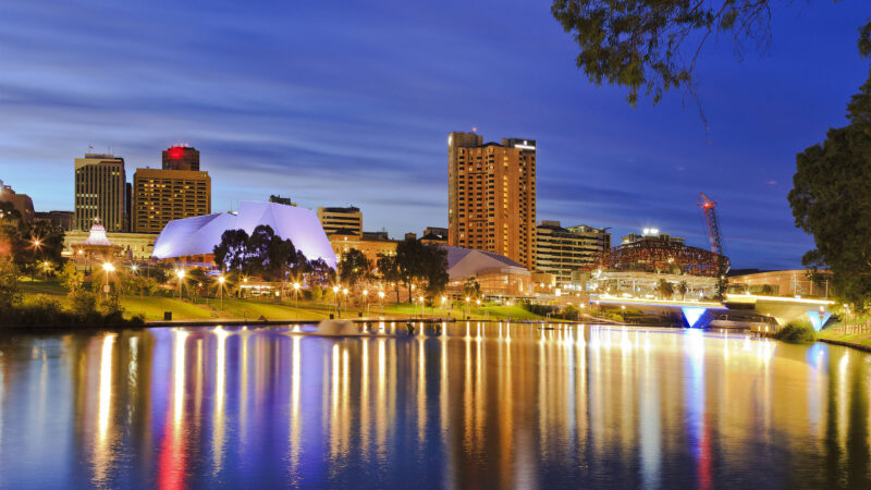 Capital of SOuth Australia – Adelaide city CBD at sunrise reflecting in still waters of torrens river