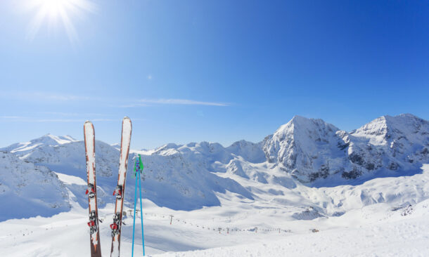 Mountains and ski equipments on slope, Alps