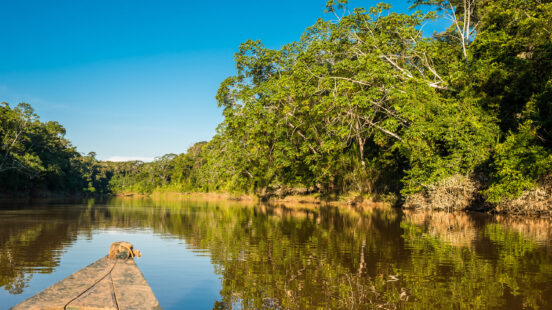 boat in Amazon jungle river at Madre de Dios peru