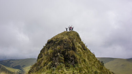 Group of people on top of a peak in Cotopaxi, Ecuador