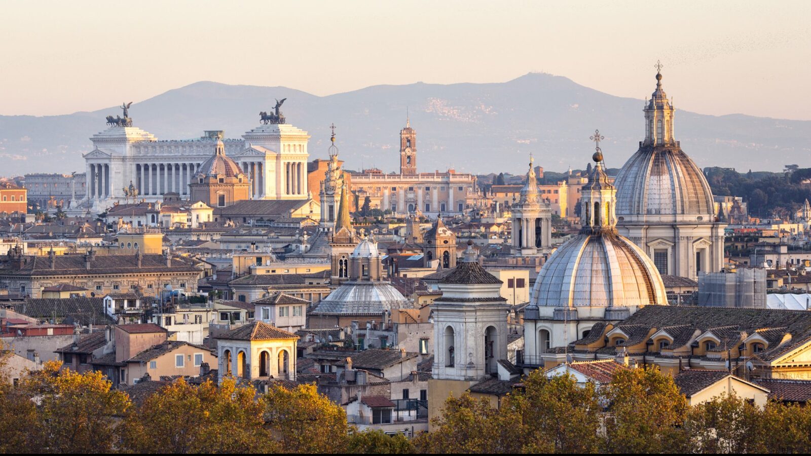 Luxury Grand Tours of Europe - Roman cityscape panorama at sunset, Rome, Italy