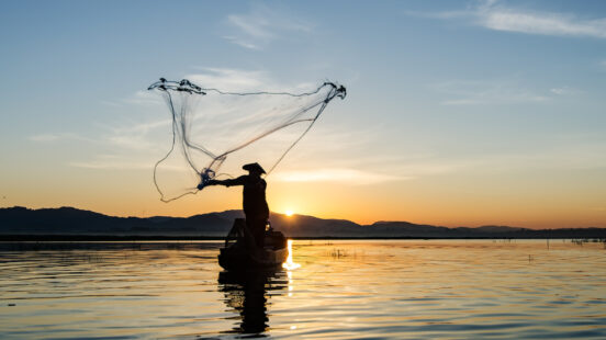 Fisherman casting net, Inle Lake, Myanmar