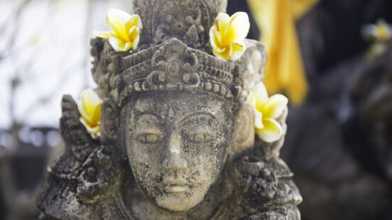 Detail of a godx27;s statue in Bali