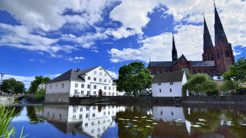 View to the historical buildings and scenic reflecting in the beauty in Uppsala, Sweden. UPPSALA, SWEDEN – May 31, 2015:Daughter to Uppsala University exchange student.View to the historical buildings and scenic reflecting in the beauty in Uppsala, Sweden.