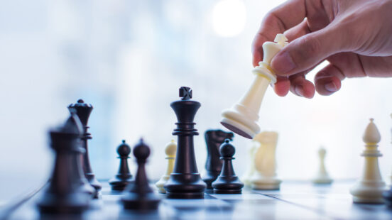 hand-moving-king-chess