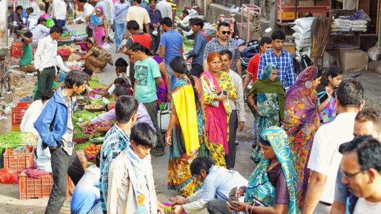 Crowded street market full of people in Jaipur, Rajasthan, India.