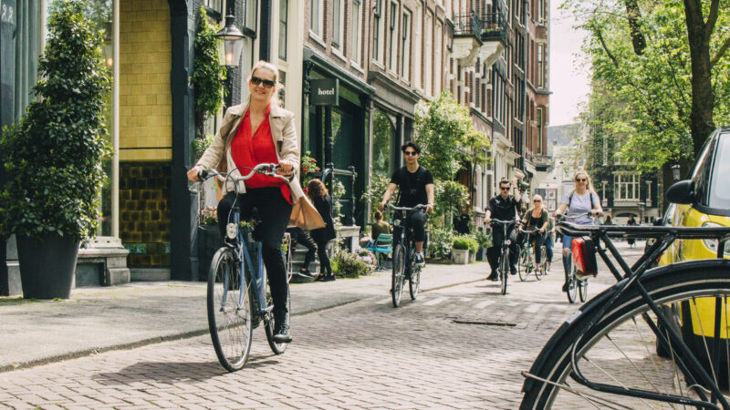 Cycle alongside an expert guide. The smart way to see the real Amsterdam, beyond the canal boat routes.