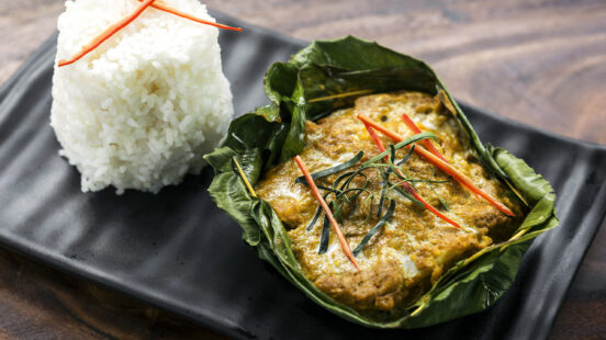 traditional Cambodian khmer fish amok curry meal