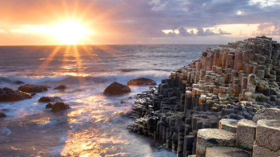 family-trips-to-ireland-and-scotland-sunset-giants-causeway-ireland