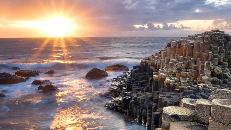 family-trips-to-ireland-and-scotland-sunset-giants-causeway-ireland