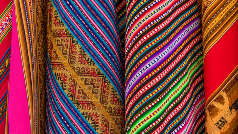 Colorful Bolivian textiles on a local art and craft market in La Paz, Bolivia,