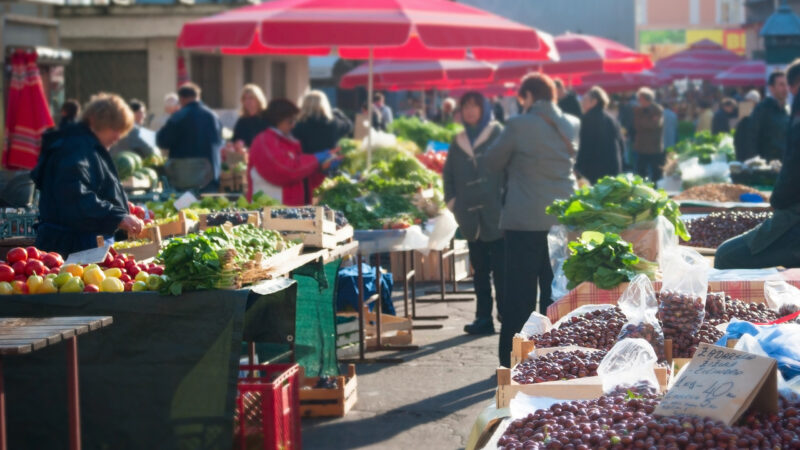 Unrecognizable people at a food market in Zagreb, Croatia