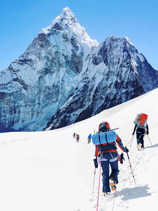 Goup of climbers reaching the Everest summit in Nepal. Team work concept. mount, mountain, nepal, everest, collaboration, ambition, cooperation, exploration, climbers, leadership, motivate, achievement, successful, leader, motivation, tourist, team, challenge, mountaineering, success, active, climbing, sport, risk, climber, peak, himalaya, top, summit, adventure, extreme, climb, travel, outdoor, mountaineer, goal, ice, expedition, reach, landscape, hiking, hiker Goup of climbers reaching the Everest summit in Nepal. Team work concept..mount, mountain, nepal, everest, collaboration, ambition, cooperation, exploration, climbers, leadership, motivate, achievement, successful, leader, motivation, tourist, team, challenge, mountaineering, success, active, climbing, sport, risk, climber, peak, himalaya, top, summit, adventure, extreme, climb, travel, outdoor, mountaineer, goal, ice, expedition, reach, landscape, hiking, hiker Goup of climbers reaching the Everest summit in Nepal. Team work mount, mountain, nepal, everest, collaboration, ambition, cooperation, exploration, climbers, leadership, motivate, achievement, successful, leader, motivation, tourist, team, challenge, mountaineering, success, active, climbing, sport, risk, climber, peak, himalaya, top, summit, adventure, extreme, climb, travel, outdoor, mountaineer, goal, ice, expedition, reach, landscape, hiking, hiker, Human, Mountain, Mountain Range, Nature, Outdoors, Person, Piste, Snow, Sport, Sports