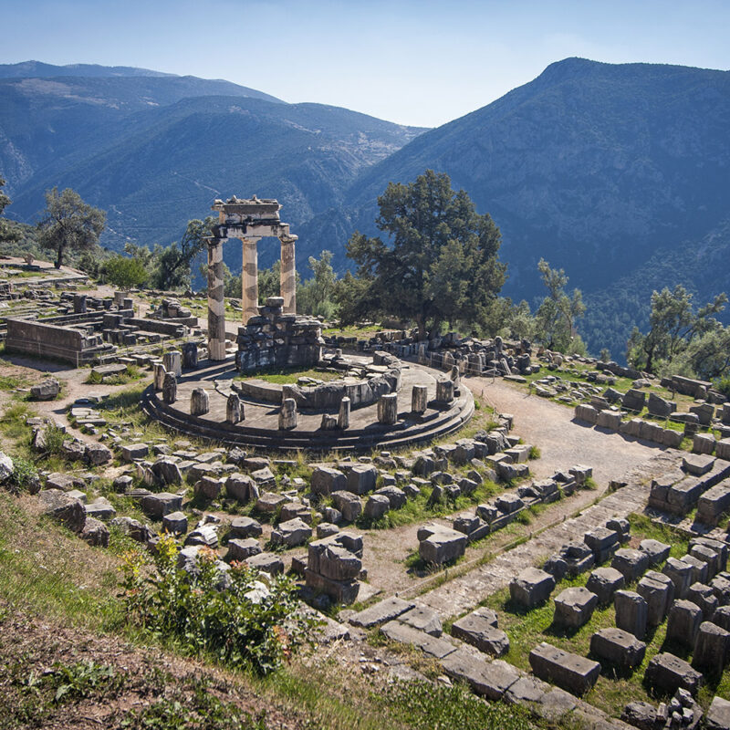 Luxury Greece Tours - Temple of Athena, in Delphi, the ancient ruins of a temple with columns