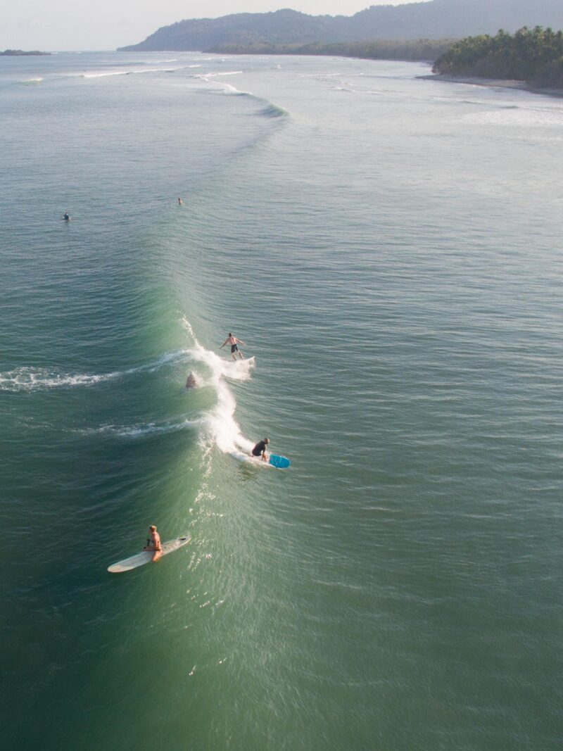 Aerial view of a surfer on a wave in Jaco, Costa Rica Costa Rica, DJI, Spring, Surfing, Aerial View, Beach, Paddleboard, Sea, Drone, Paddleboarding, Family, People, Sport, Fun, Surfboard, Photography, Boarding, Leisure Activity, Surfing the Net, Blackboard, Outdoors, Plank, Snowboarding, Horizontal, Lifestyles, Summer, santa, teresa, nicoya, wave, surf, surfer Jaco, Costa Rica – April 12, 2016: Aerial view of a surfer on a wave in Jaco, Costa Rica