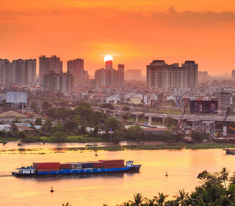 Luxury Vietnam Tours - The sun setting behind the city of Saigon
