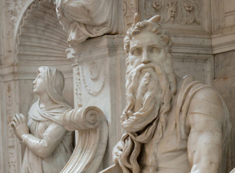 A marble statue of a bearded man in Rome.