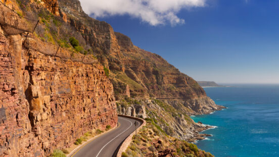 The winding Champmanx27;s Peak Drive overlooking the ocean in Cape Town, South Africa.