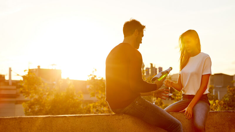 Sharing bubbles on their balcony