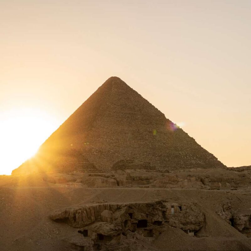 Luxury Egypt Tours - archaeological complex of Great Egyptian Pyramids is located on the Giza plateau, in the Libyan desert, on the left bank of the Nile. Pyramids of Cheops Khufu. Cairo, Egypt.